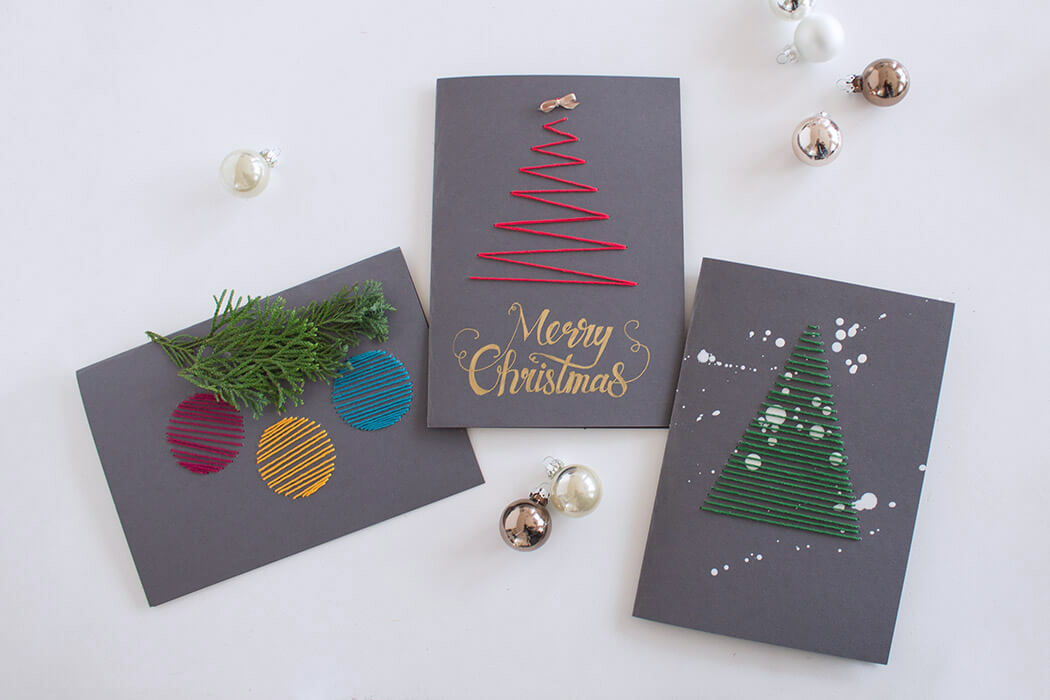 Bestickte Weihnachtskarten mit Tannenbaum aus rotem und grünem Stickgarn